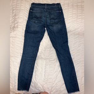 7 for All Mankind mid rise Blue Jeans with distressed hem
